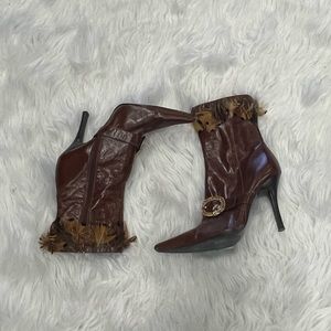 Brown leather booties with feather trim